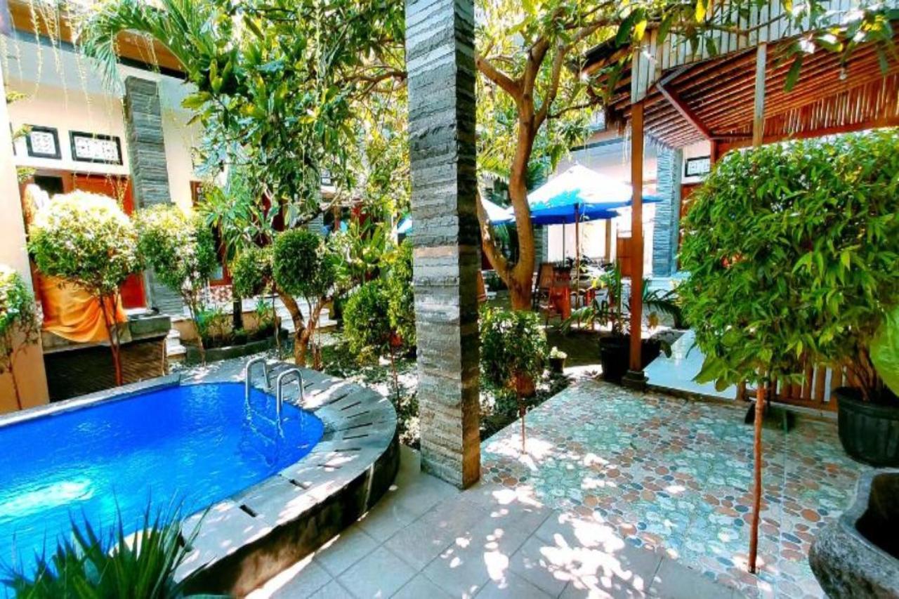 Oyo Flagship 91237 Ratu Guest House Kedunganan ภายนอก รูปภาพ