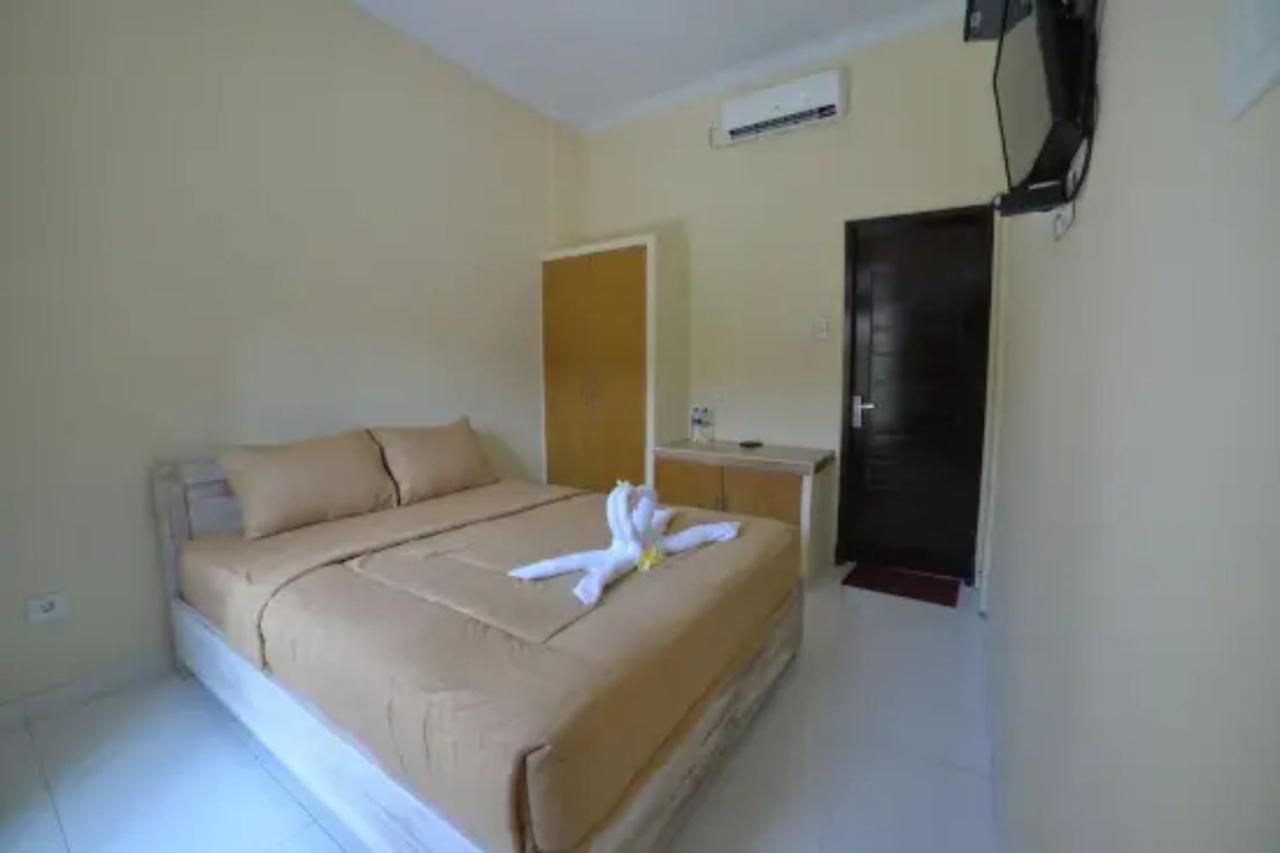 Oyo Flagship 91237 Ratu Guest House Kedunganan ภายนอก รูปภาพ