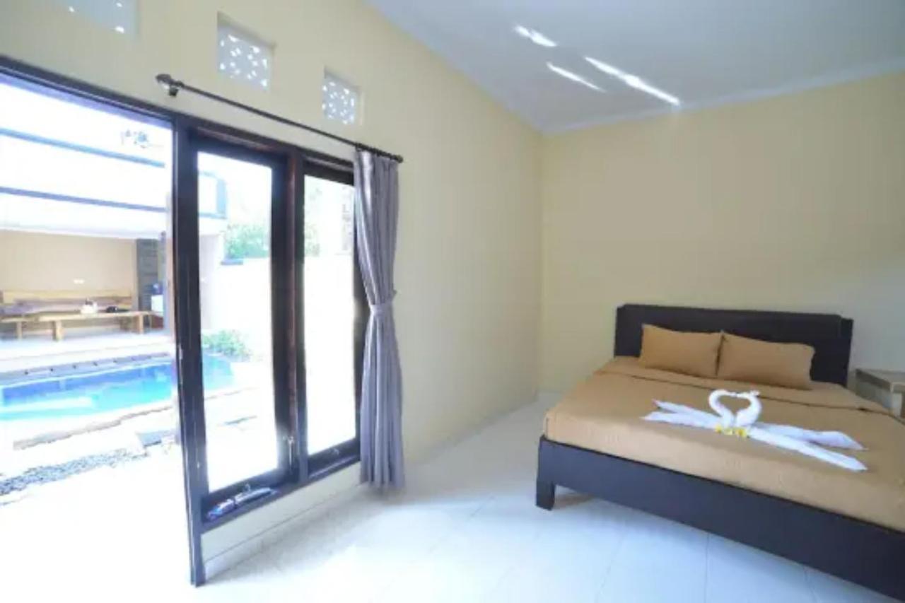 Oyo Flagship 91237 Ratu Guest House Kedunganan ภายนอก รูปภาพ