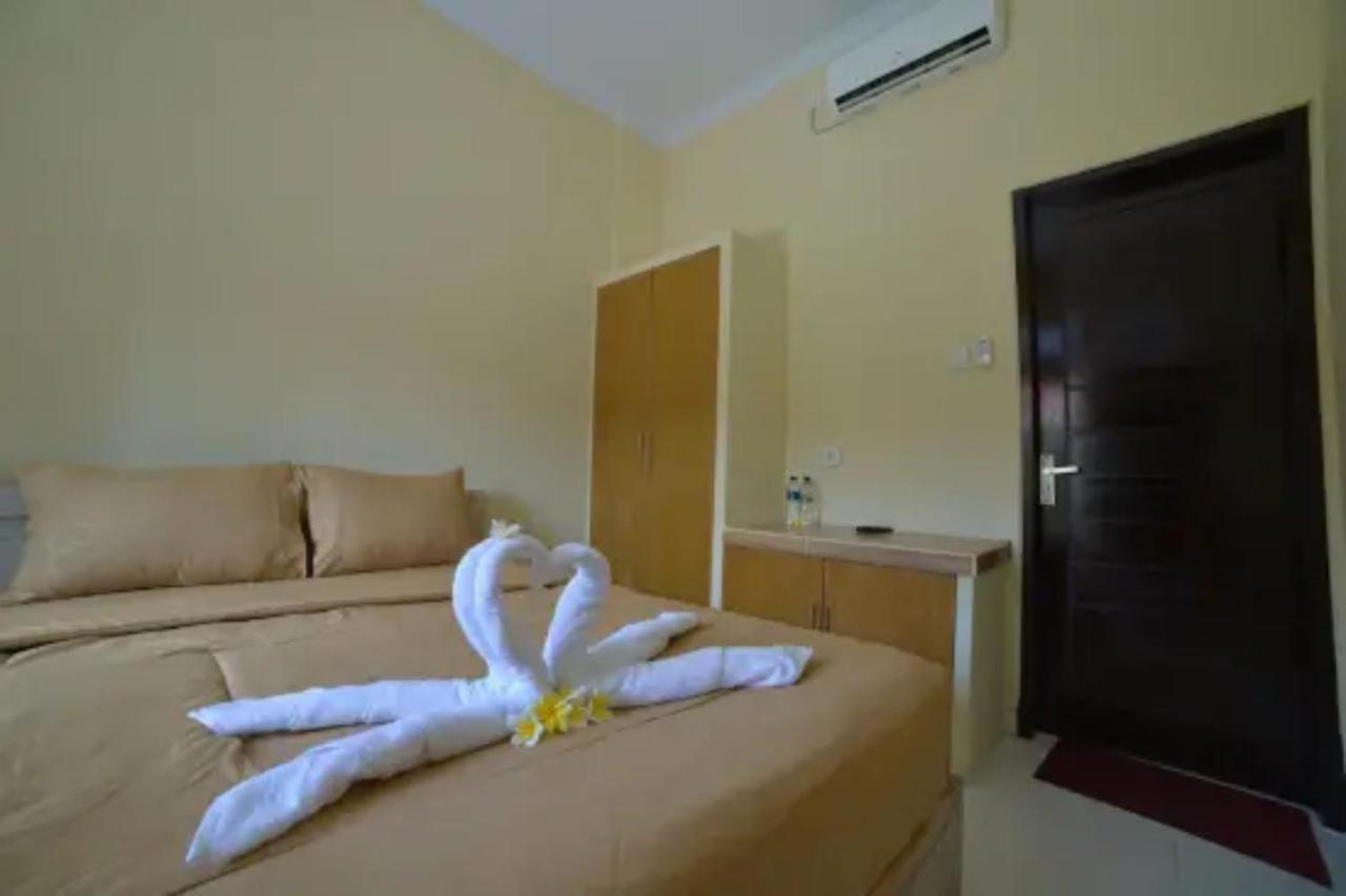 Oyo Flagship 91237 Ratu Guest House Kedunganan ภายนอก รูปภาพ