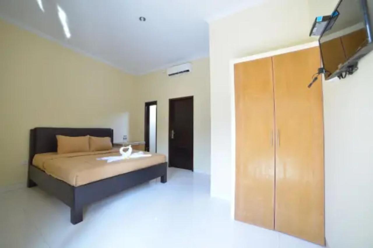 Oyo Flagship 91237 Ratu Guest House Kedunganan ภายนอก รูปภาพ