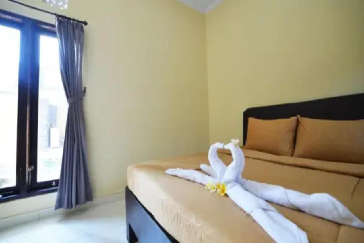 Oyo Flagship 91237 Ratu Guest House Kedunganan ภายนอก รูปภาพ