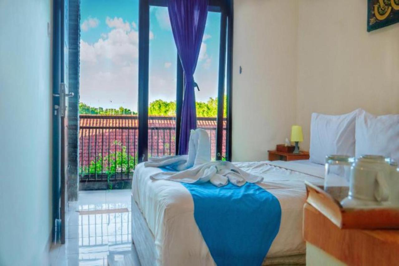 Oyo Flagship 91237 Ratu Guest House Kedunganan ภายนอก รูปภาพ